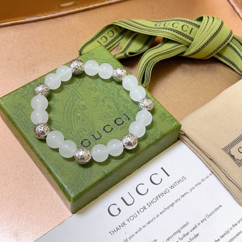 G*u*i bracelets